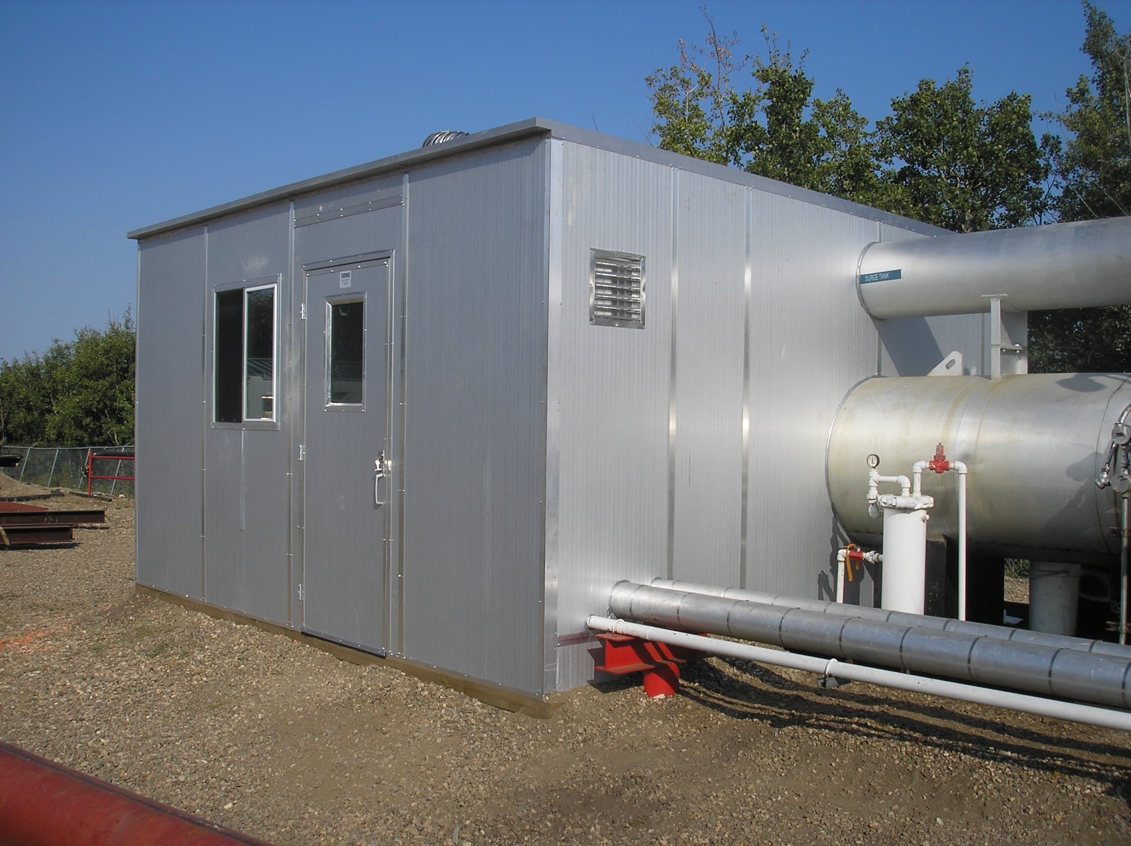 Self-framing steel building panels during erection